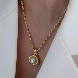 Waterproof gold plated twist round pendant